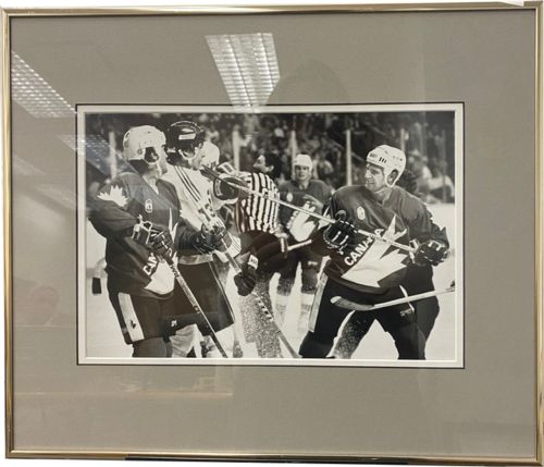 Lot #29.7 Photo by Record Photographer - Team Canada Hockey: Stick to the face