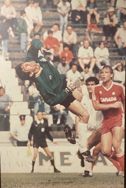 Image for Lot #8.7 “Greek soccer goalie strives to defend against Canada at game at Varsity Stadium” Photographed by Tony Bock 1988